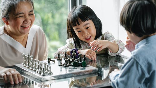elderly playing together with kids